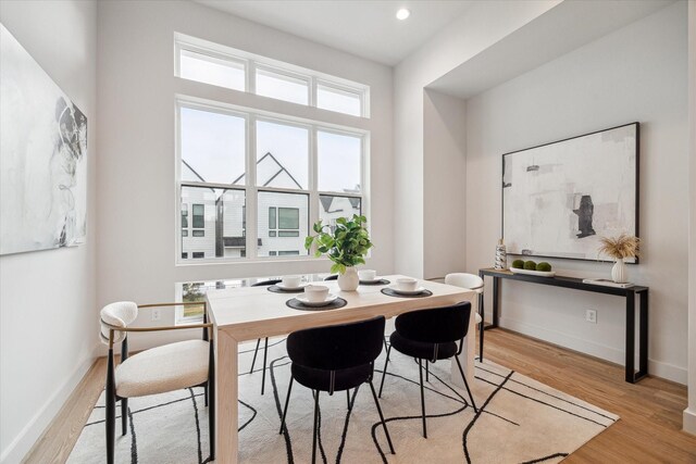 dining room featuring light hardwood / wood-style floors