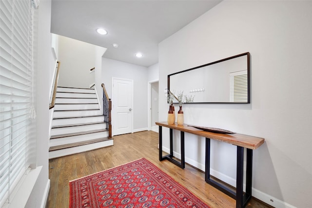 entrance foyer featuring hardwood / wood-style flooring