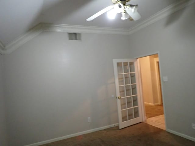 carpeted empty room with ornamental molding and ceiling fan