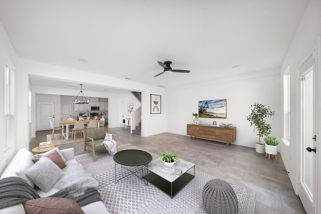 living room featuring ceiling fan