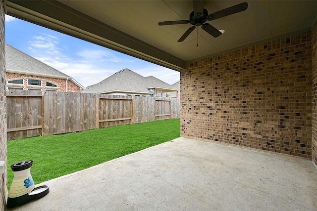 view of patio featuring ceiling fan