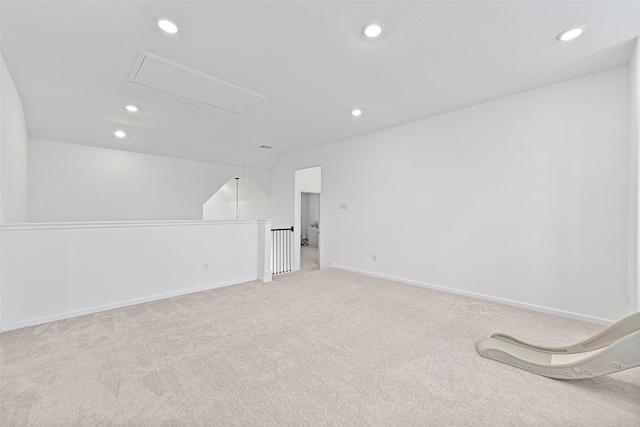 empty room featuring light colored carpet