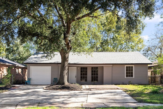 ranch-style home with a garage