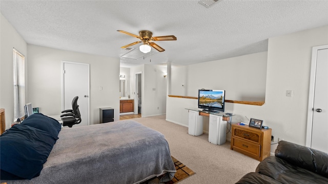 carpeted bedroom with a textured ceiling