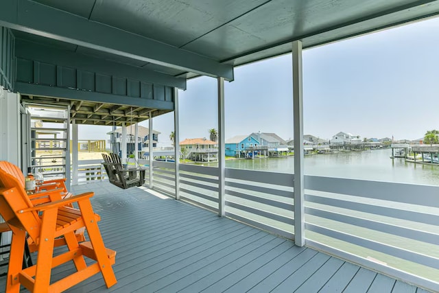 sunroom with a water view