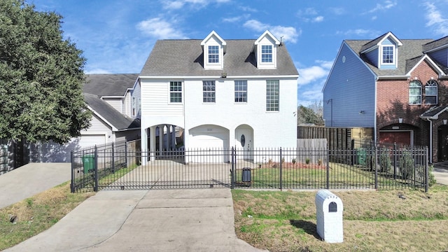 view of front of property featuring a garage