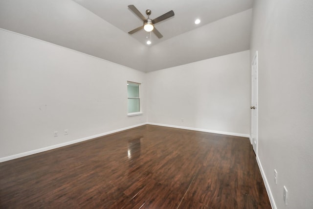 unfurnished room featuring ceiling fan, lofted ceiling, and dark hardwood / wood-style flooring