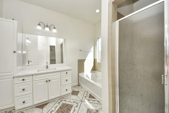 bathroom featuring vanity, tile patterned floors, and plus walk in shower