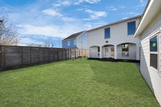 view of yard with a deck