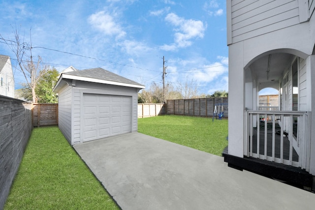 garage with a lawn