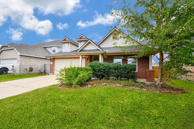 view of front of property featuring a garage and a front lawn