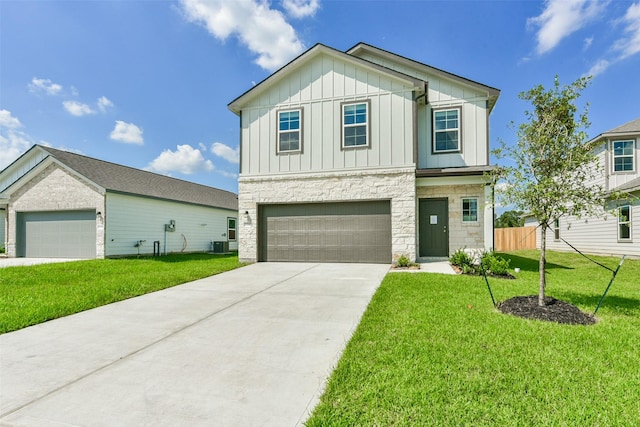 view of front of home with a garage, a front yard, and cooling unit