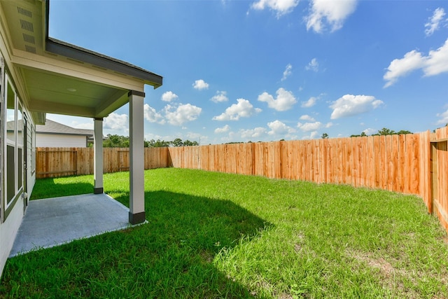 view of yard with a patio area