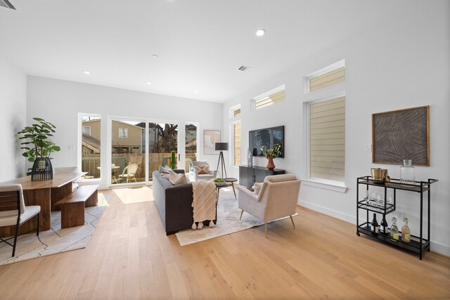 living room with light hardwood / wood-style floors