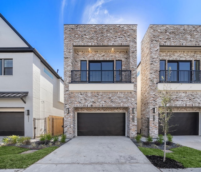 view of front of house featuring a balcony and a garage