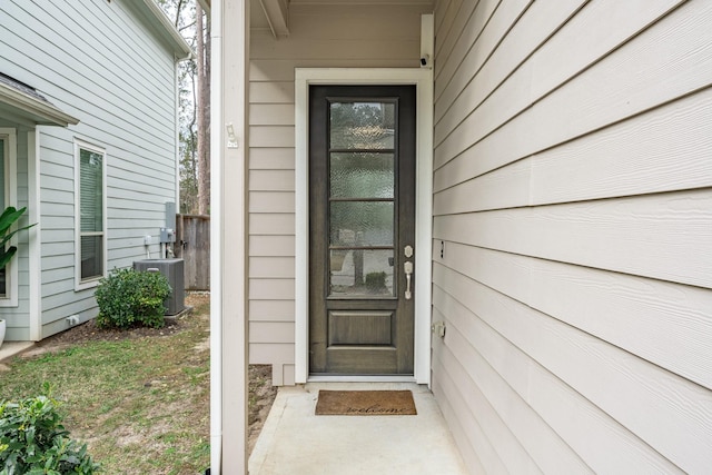 entrance to property featuring central AC unit