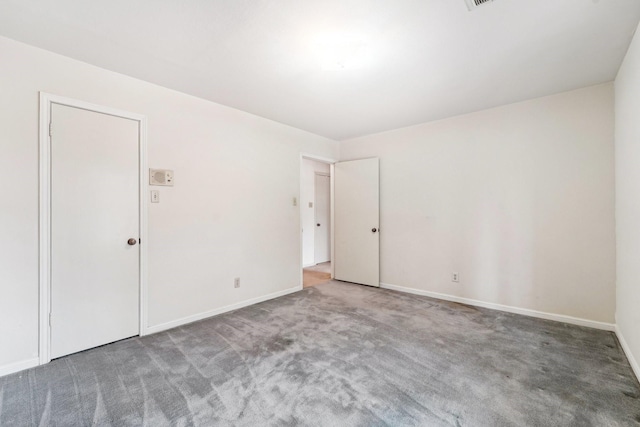 empty room with carpet floors