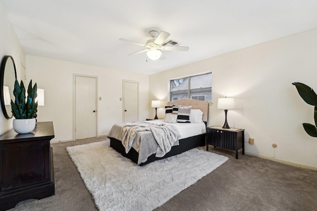 carpeted bedroom with ceiling fan