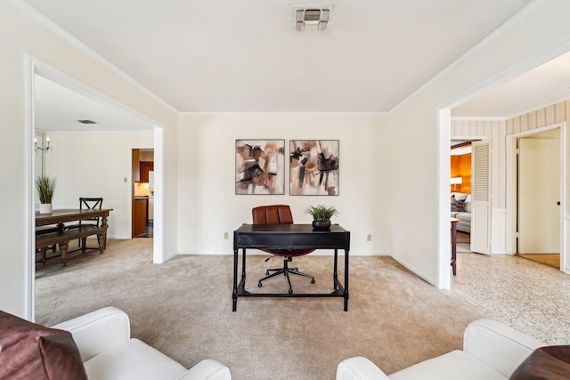 carpeted home office featuring an inviting chandelier and ornamental molding