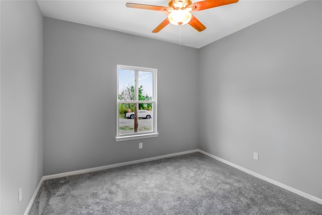 carpeted empty room with ceiling fan