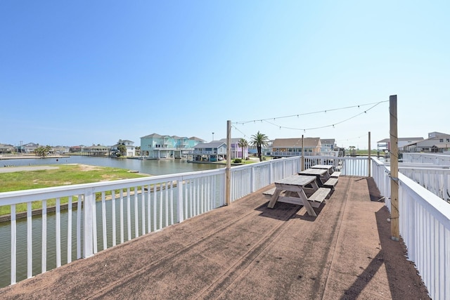 deck featuring a water view