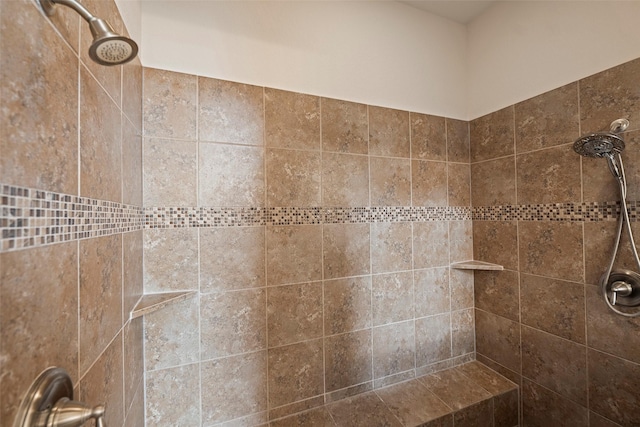 bathroom featuring tiled shower