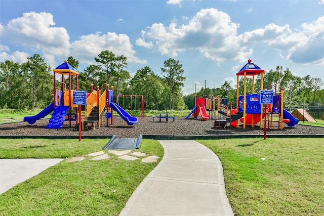 1312 Cypress Ln, Dayton, TX 77535 - community play area with a lawn