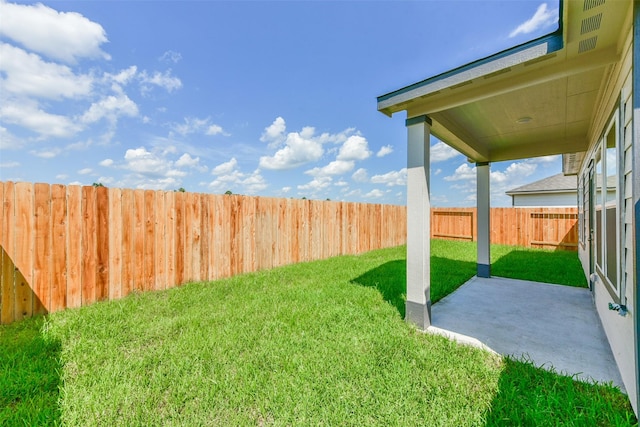 1312 Cypress Ln, Dayton, TX 77535 - fenced backyard with a patio
