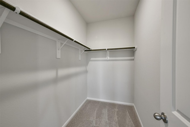 1312 Cypress Ln, Dayton, TX 77535 - spacious closet featuring carpet floors