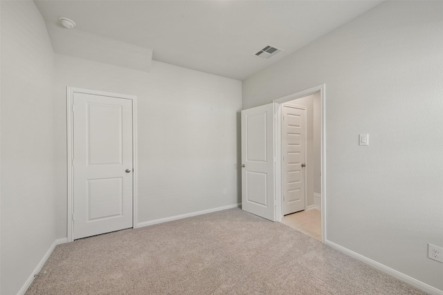 1312 Cypress Ln, Dayton, TX 77535 - unfurnished bedroom with light colored carpet and baseboards