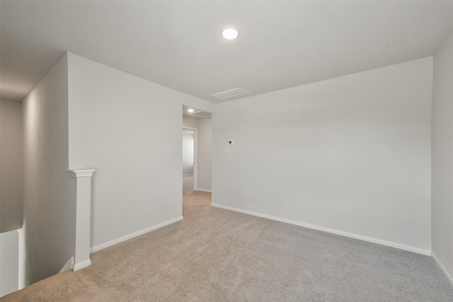 1312 Cypress Ln, Dayton, TX 77535 - spare room with light carpet, recessed lighting, and attic access