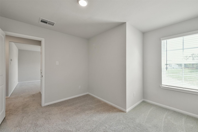1312 Cypress Ln, Dayton, TX 77535 - spare room with light colored carpet and plenty of natural light