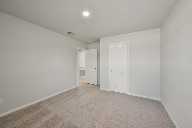 1312 Cypress Ln, Dayton, TX 77535 - unfurnished bedroom featuring light colored carpet