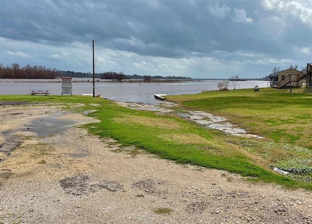 view of yard with a water view