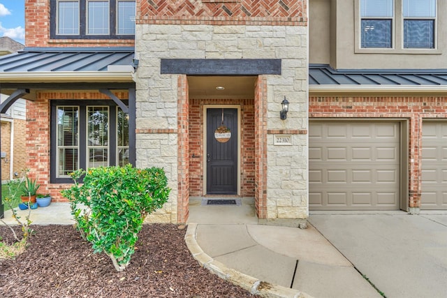 view of exterior entry featuring a garage