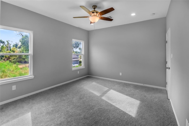 unfurnished room with carpet floors, recessed lighting, ceiling fan, and baseboards