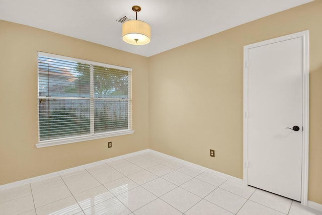 view of tiled spare room