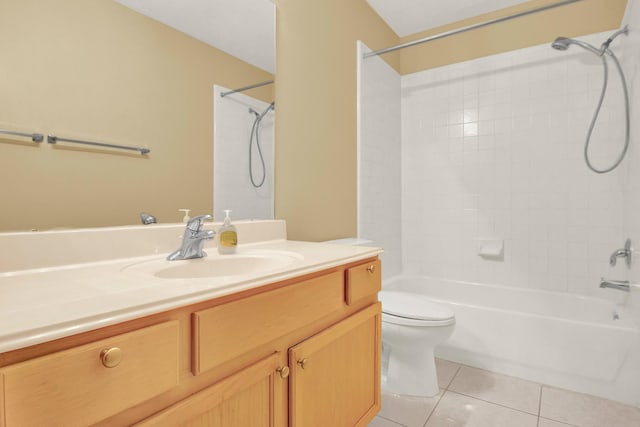 full bathroom featuring vanity, tile patterned floors, toilet, and bathtub / shower combination