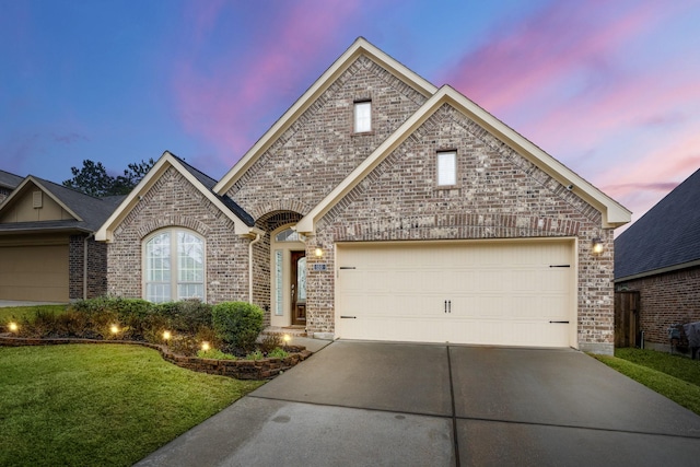 view of front of property with a yard