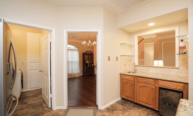 bathroom with vanity, hardwood / wood-style flooring, and ornamental molding