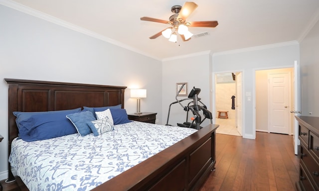 bedroom with ceiling fan, ornamental molding, dark hardwood / wood-style flooring, and connected bathroom