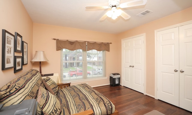 bedroom featuring ceiling fan and dark hardwood / wood-style flooring