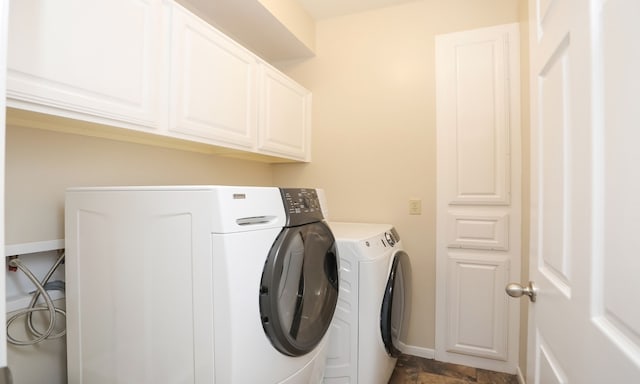 laundry room with cabinets and independent washer and dryer