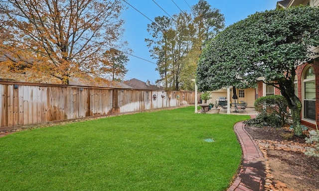 view of yard with a patio area