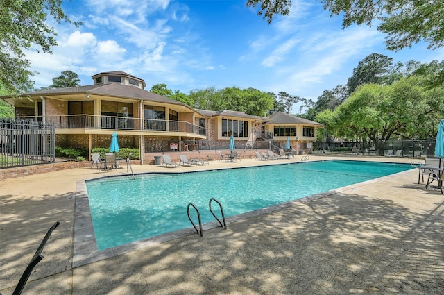 view of pool featuring a patio