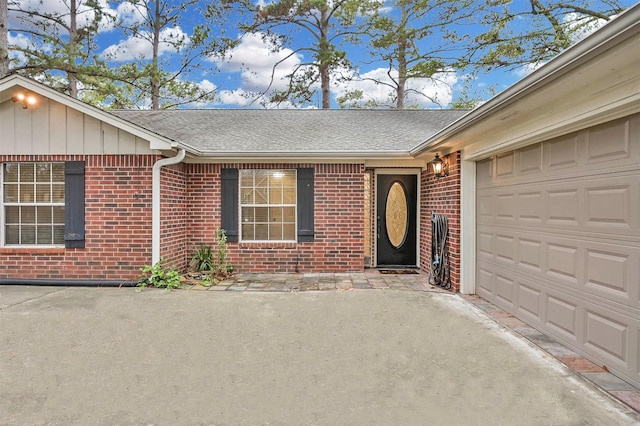 property entrance featuring a garage