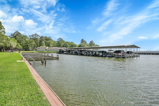 dock area featuring a water view and a lawn