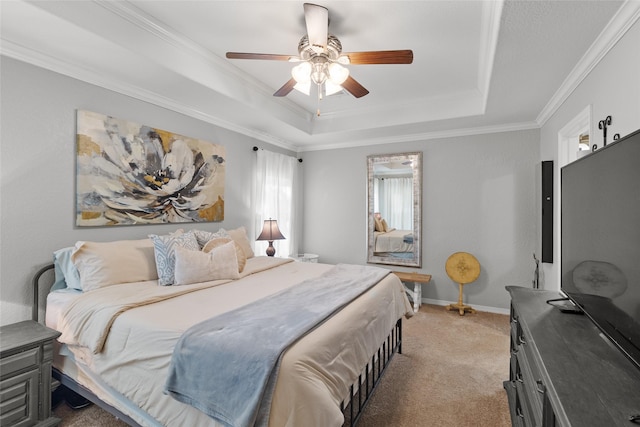 bedroom featuring crown molding, ceiling fan, a raised ceiling, and multiple windows