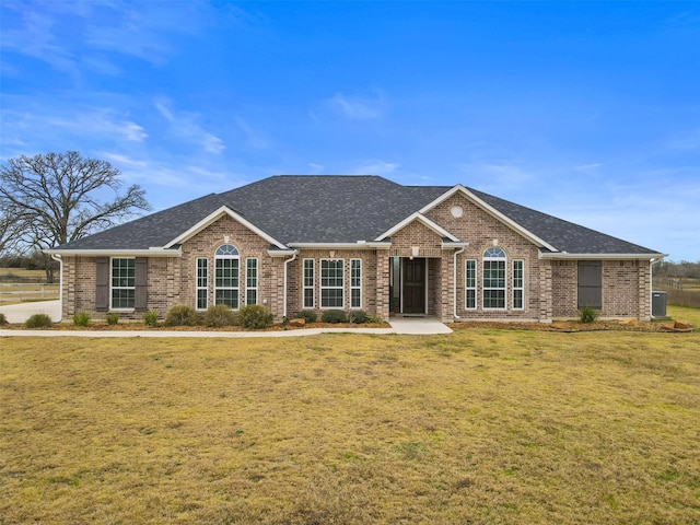 ranch-style home with a front yard