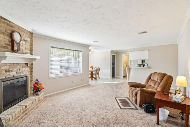 carpeted living room with a brick fireplace, crown molding, a textured ceiling, and ceiling fan